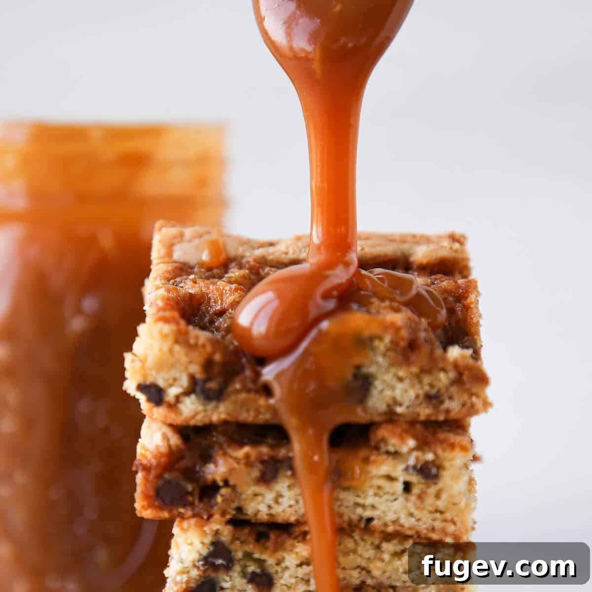 Chewy Caramel Chocolate Chip Blondies 6 Caramel Chocolate Chip Blondies caramel pour close up detail
