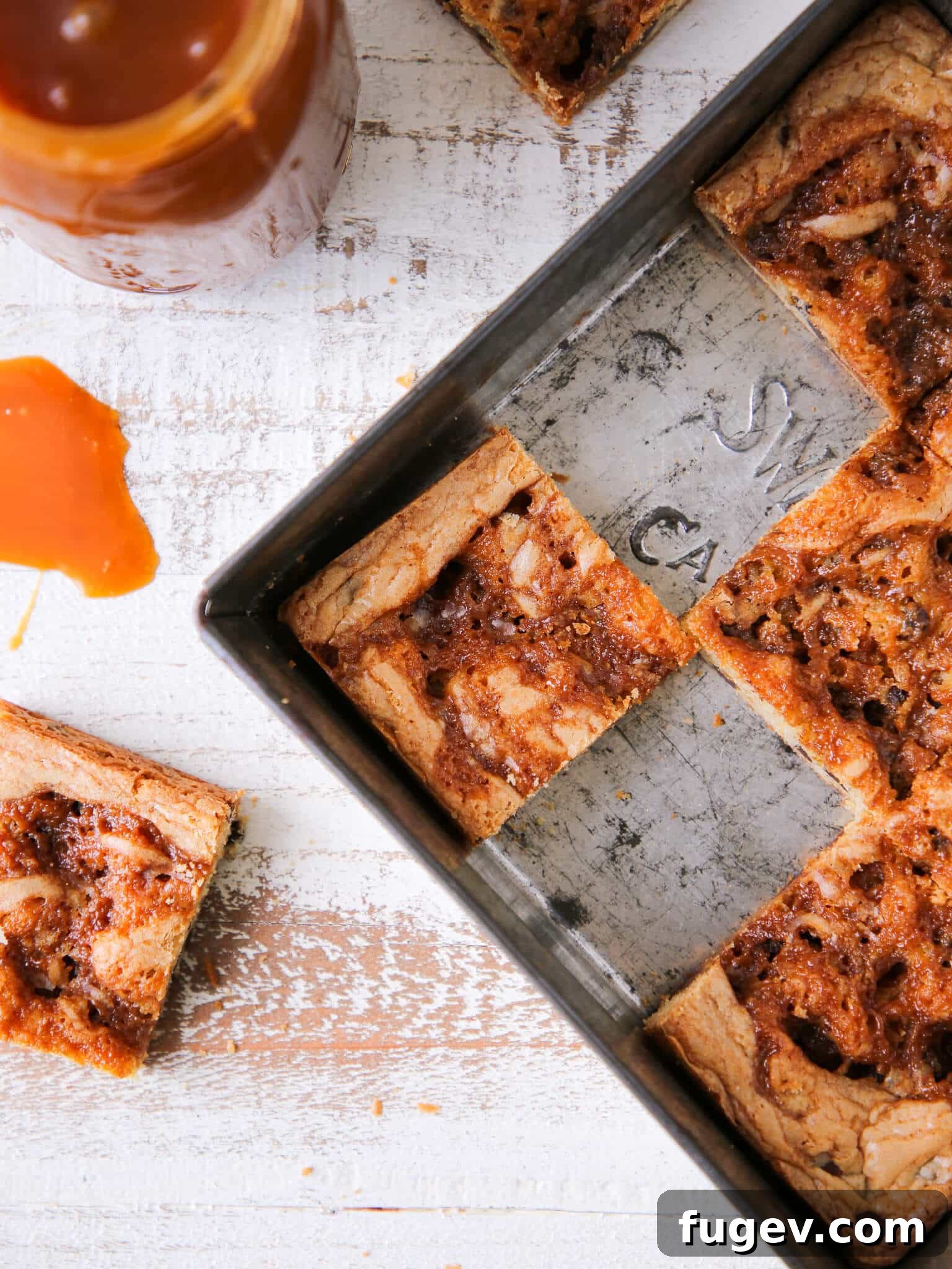 Chewy Caramel Chocolate Chip Blondies 7 Caramel Chocolate Chip Blondies sliced in vintage baking pan