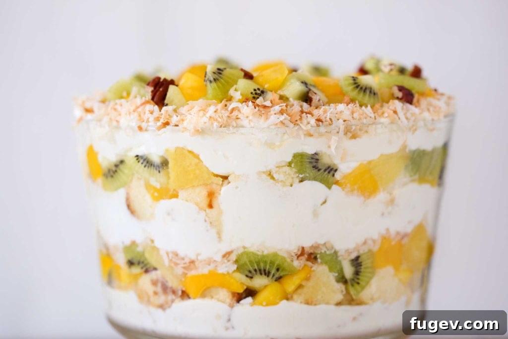 Paradise Trifle Delight 7 Tropical Trifle presented against a clean white background for a professional dessert shot
