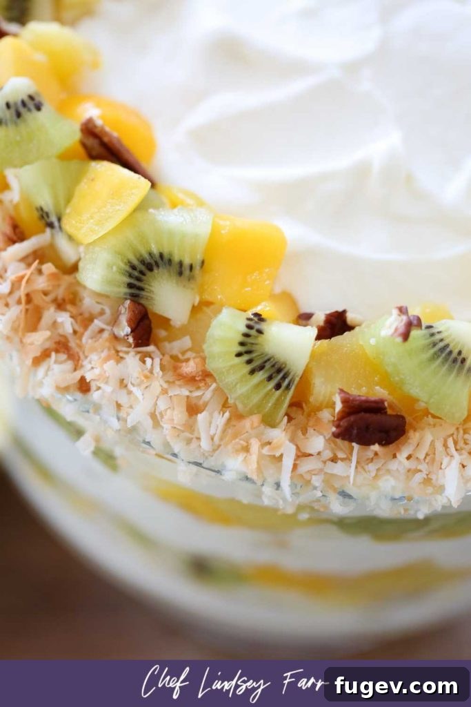 Paradise Trifle Delight 10 Top-down view of a Tropical Trifle, garnished with fresh fruit and toasted coconut