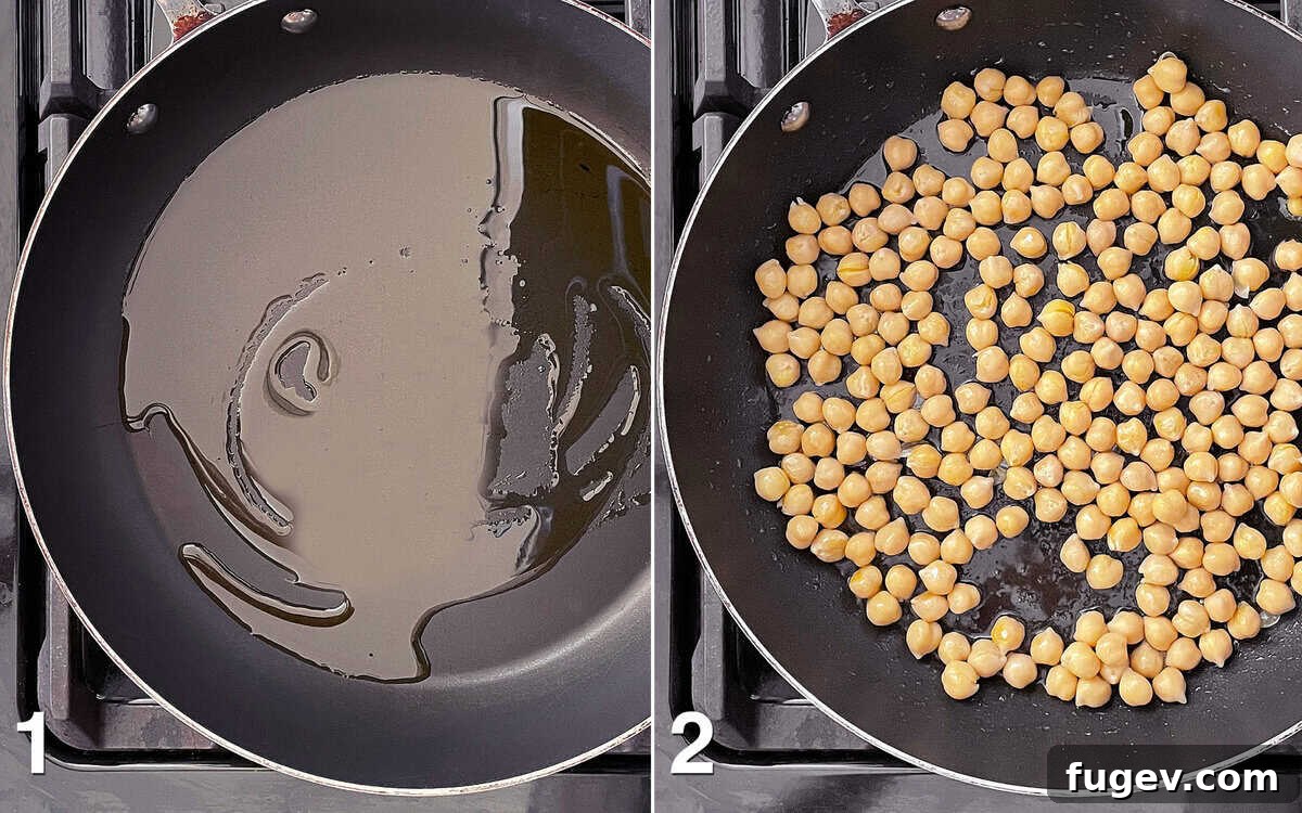 Hearty Spinach Chickpea Pasta 4 A large skillet on a stove burner with olive oil and chickpeas beginning to sauté, turning golden brown.