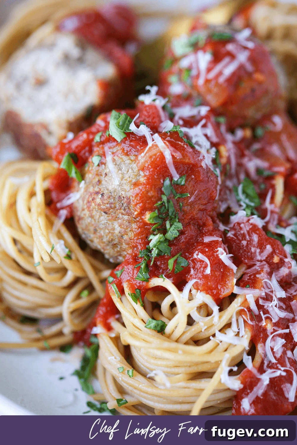Juicy Baked Turkey Meatballs 7 Close-up of Baked Turkey Meatballs on a fork
