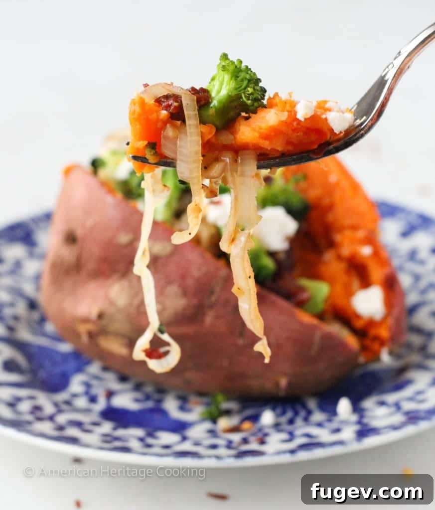 Plant Powered Stuffed Sweet Potatoes 3 Two halves of vegetarian stuffed sweet potatoes on a plate