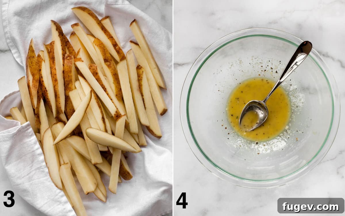 Quick & Crispy Garlic Oven Fries 5 Dried potato batons arranged on a towel next to a bowl of olive oil, seasonings, and cornstarch mixture.