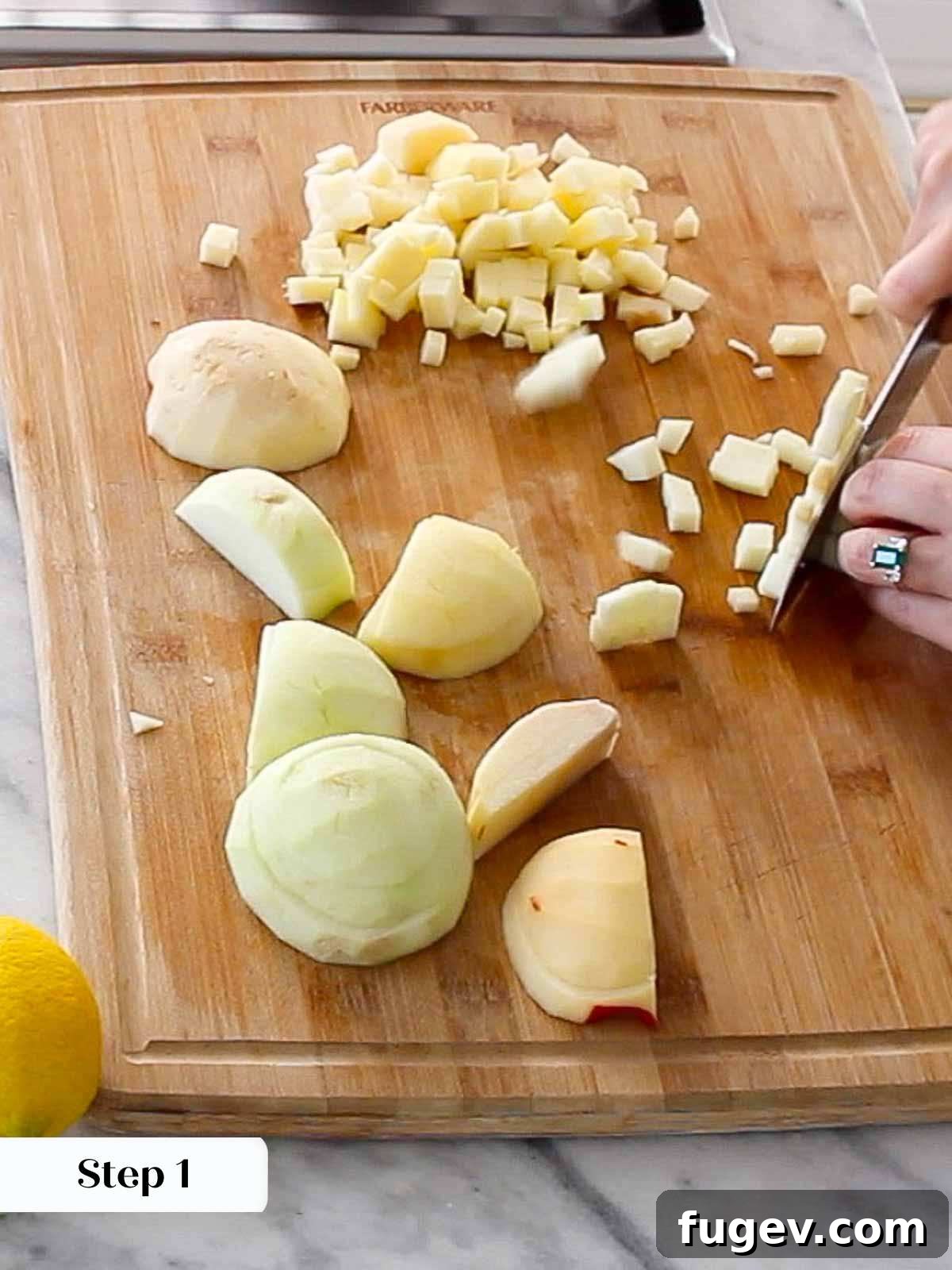 Flaky Apple Turnovers 4 Dicing fresh apples into small, uniform pieces for the hand pie filling.