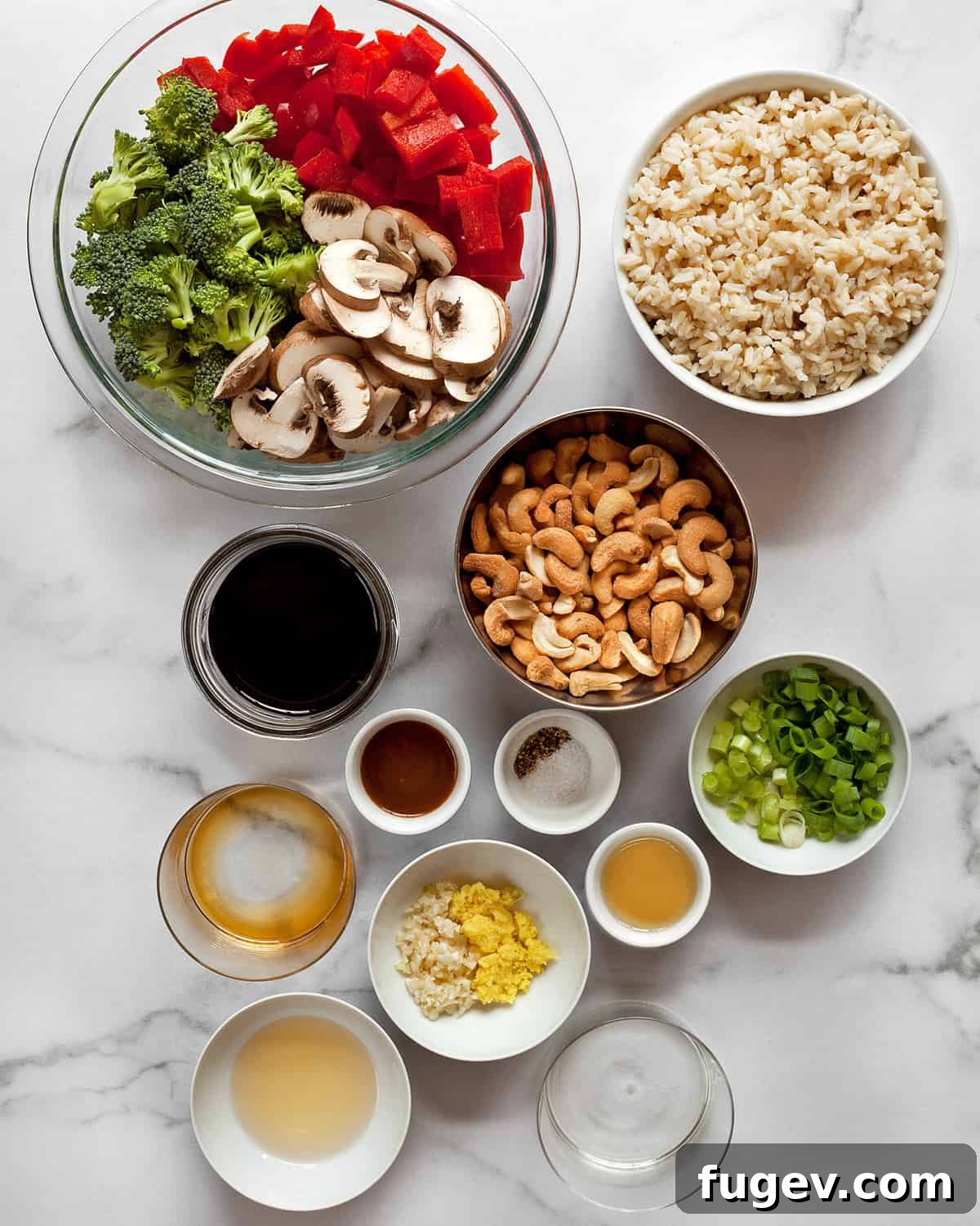 Golden Cashew Vegetable Wok 3 Ingredients for stir-fry including bell peppers, mushrooms, broccoli, cashews, garlic, and ginger.