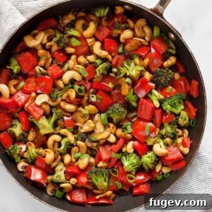 Golden Cashew Vegetable Wok 8 Veggie stir-fry in a skillet.