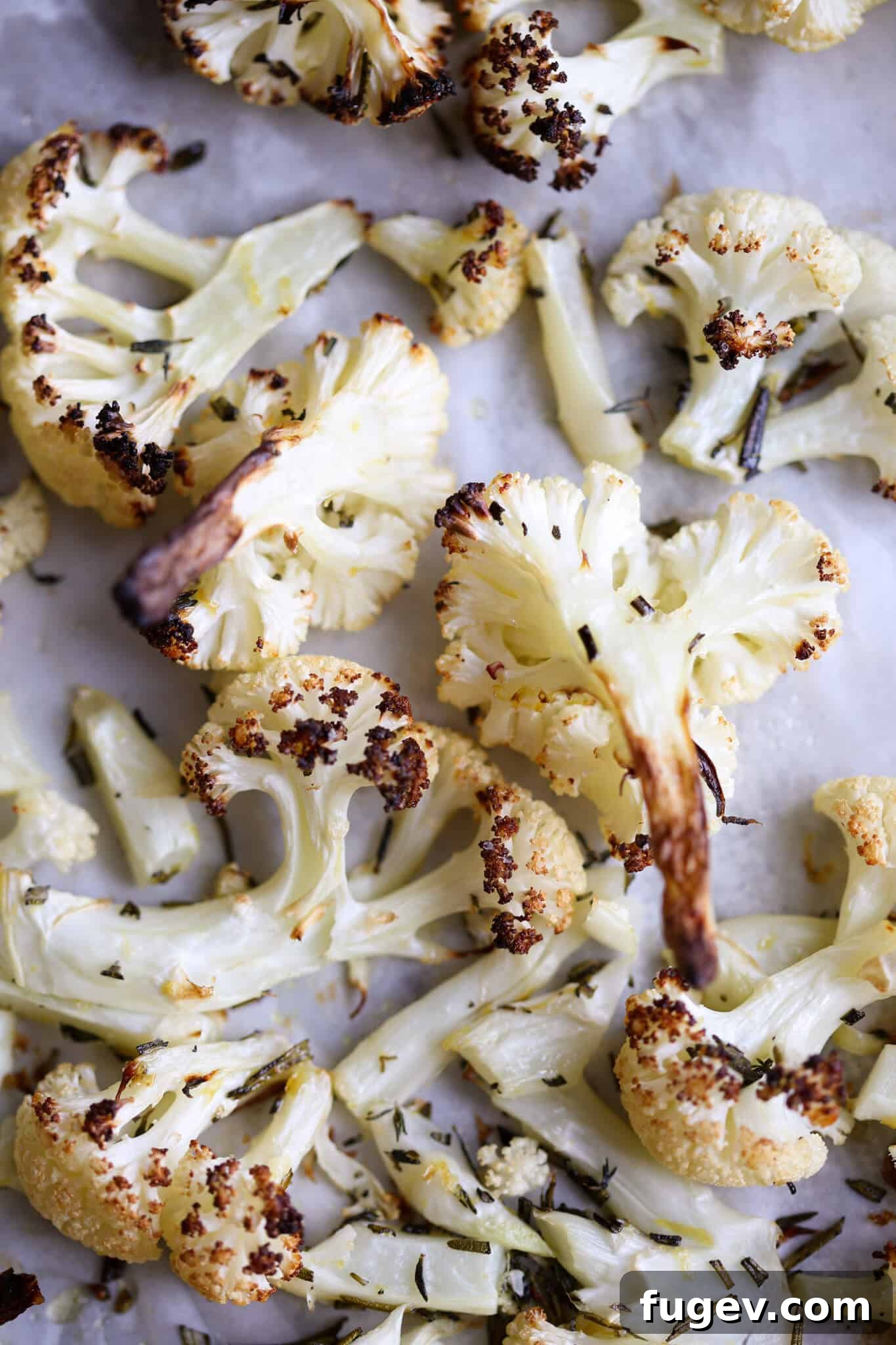 Zesty Rosemary Lemon Roasted Cauliflower 2 Easy Rosemary Lemon Roasted Cauliflower on baking sheet