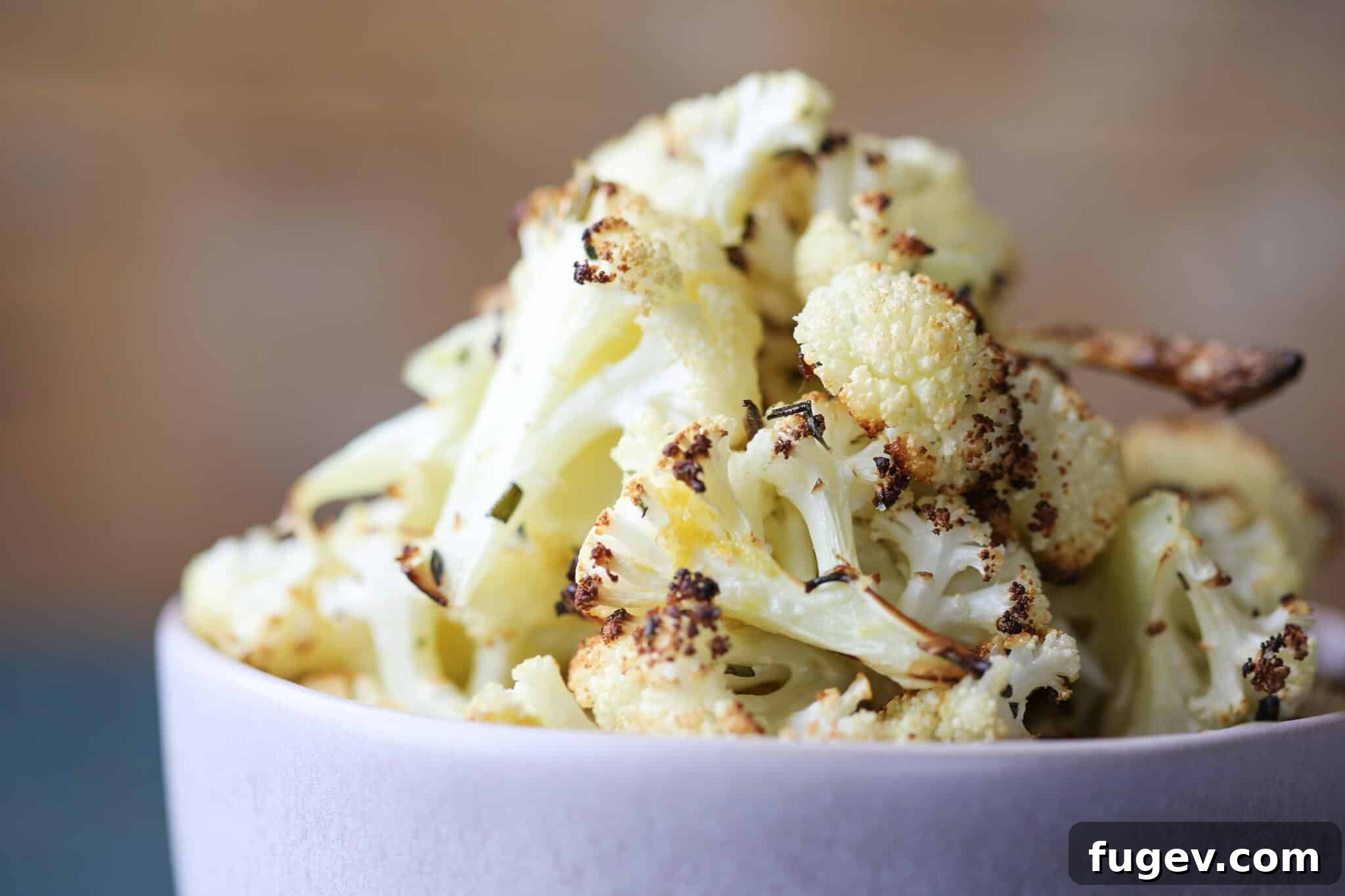 Zesty Rosemary Lemon Roasted Cauliflower 4 Easy Rosemary Lemon Roasted Cauliflower pink bowl