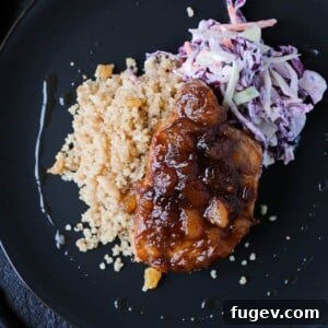 Spicy Peach Pork Chops served as a complete dish with vibrant side dishes, showcasing a perfect meal.