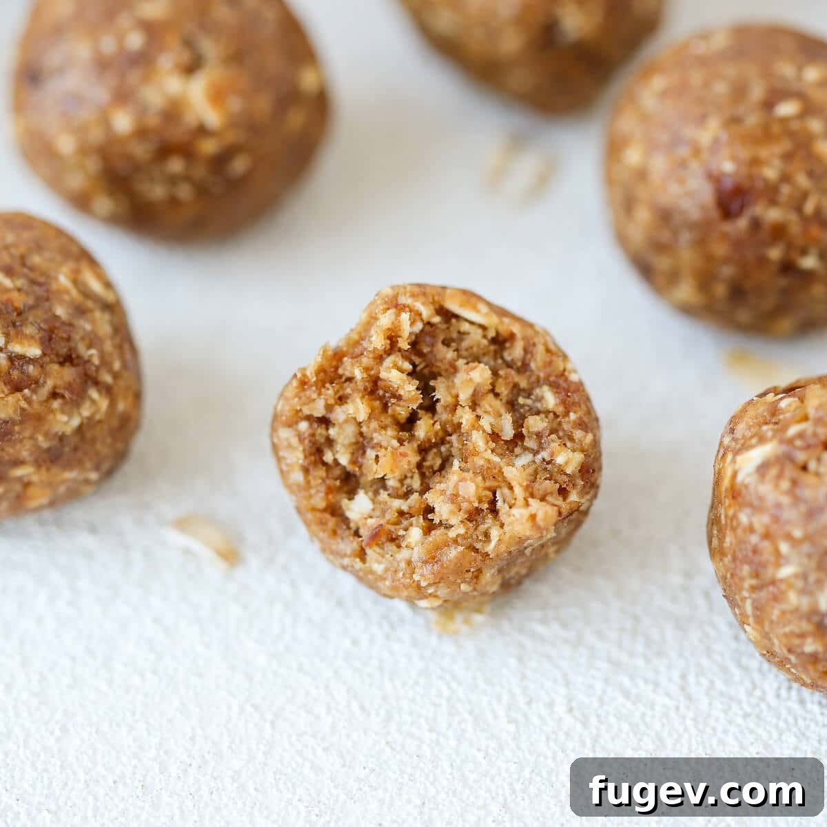 Peanut Butter Banana Fuel Poppers 3 Peanut Butter Banana Energy Bites Bitten - Showing the delicious texture inside.