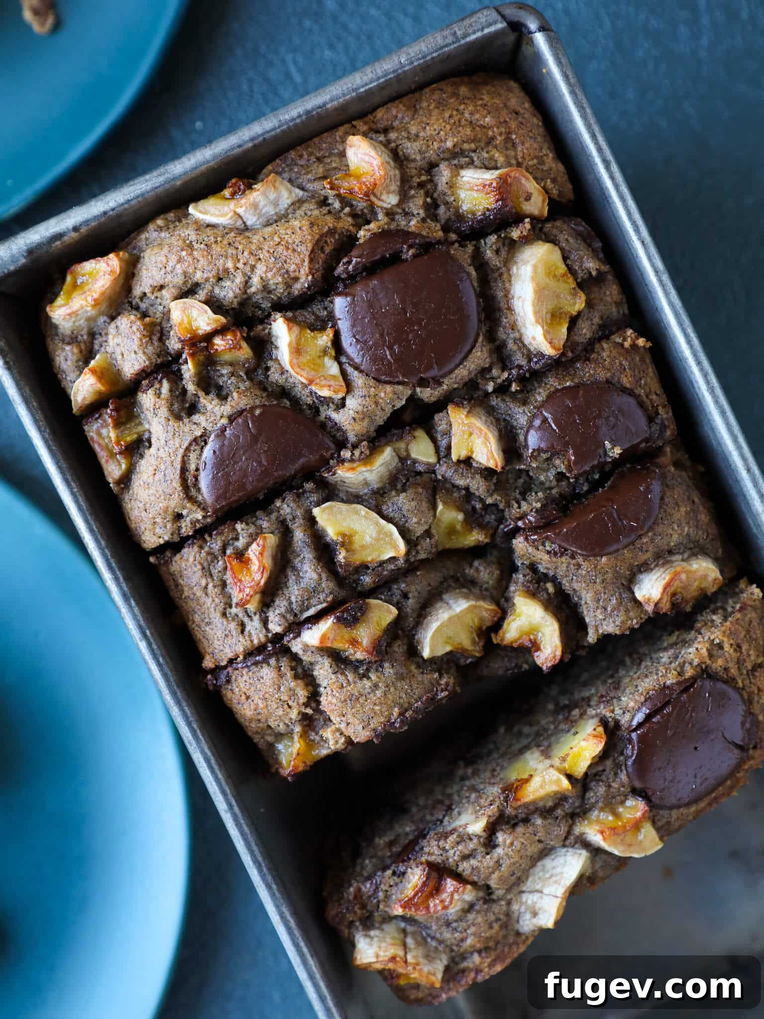 Irresistible Vegan Chocolate Chip Banana Loaf 2 Sliced Vegan Gluten-Free Chocolate Chip Buckwheat Banana Bread revealing its moist interior and chocolate chips