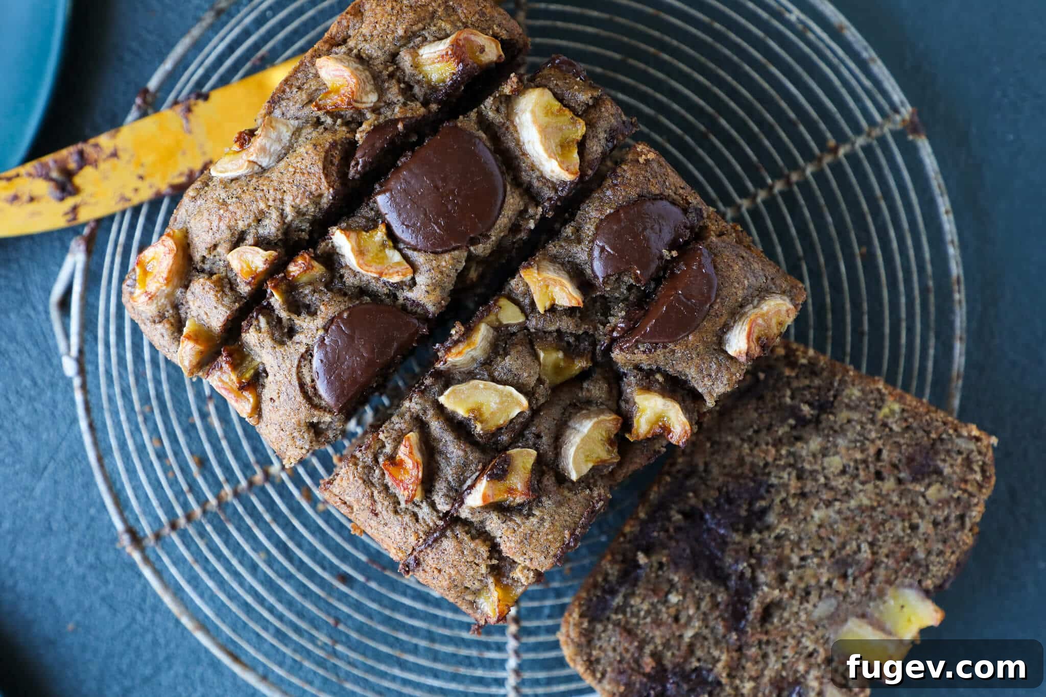 Irresistible Vegan Chocolate Chip Banana Loaf 4 Freshly baked Vegan Gluten-Free Chocolate Chip Buckwheat Banana Bread cooling on a wire rack