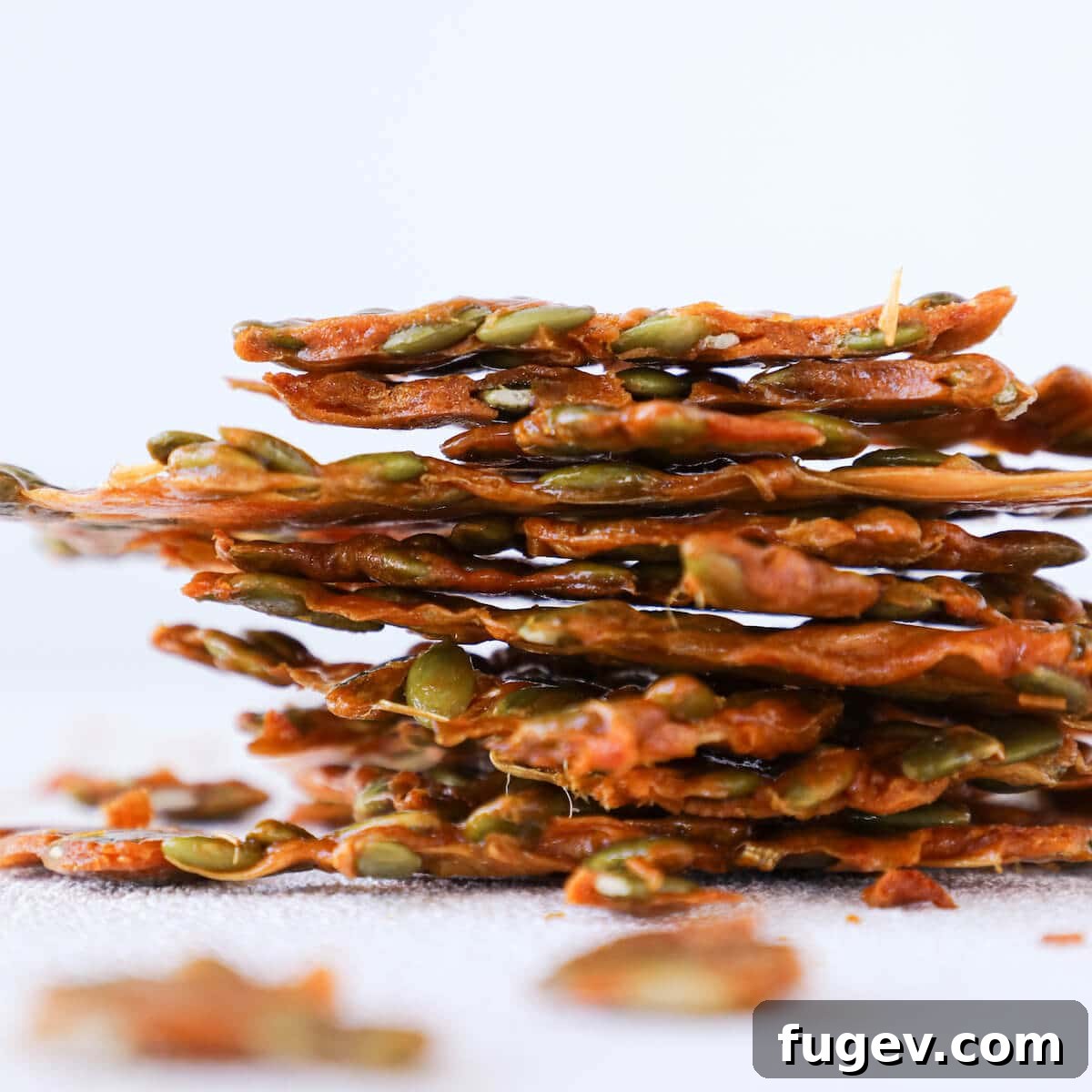 Roasted Pumpkin Seed Crunch 3 Pumpkin Seed Brittle Sideview on a Cooling Rack