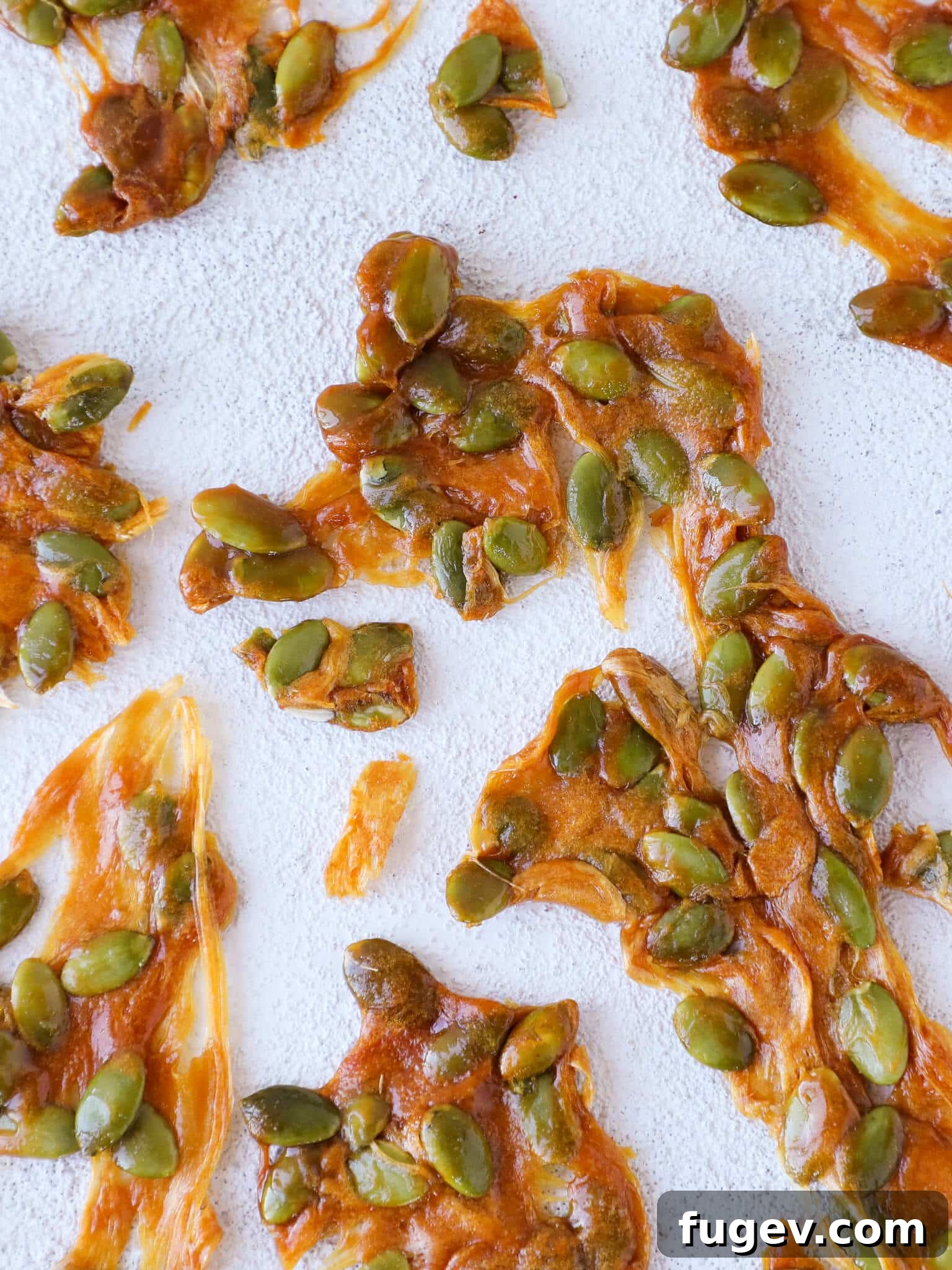 Roasted Pumpkin Seed Crunch 5 Pumpkin Seed Brittle with a White Background