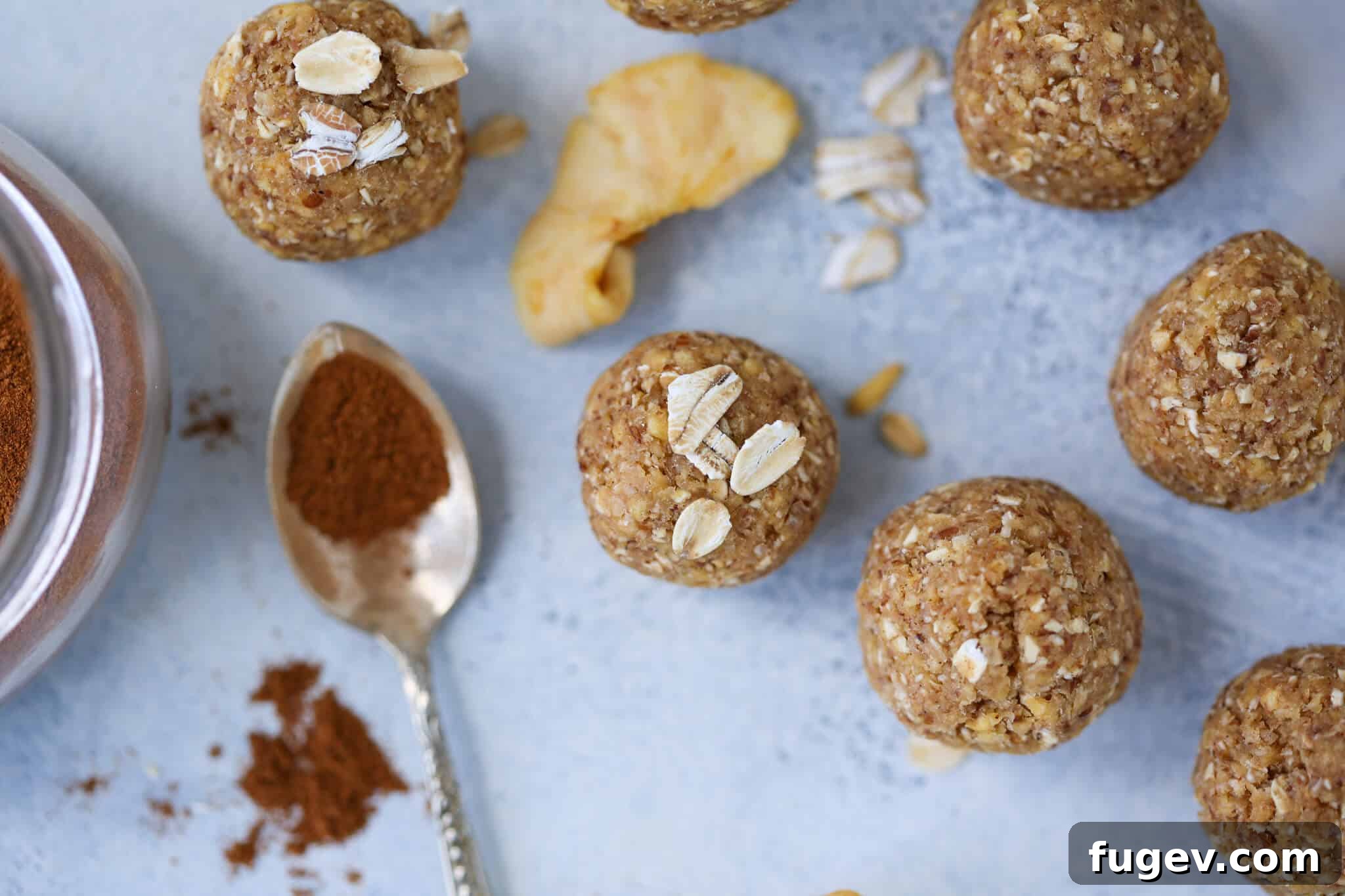 Apple Crisp Power Bites 3 Apple Crisp Energy Bites with an apple slice for garnish