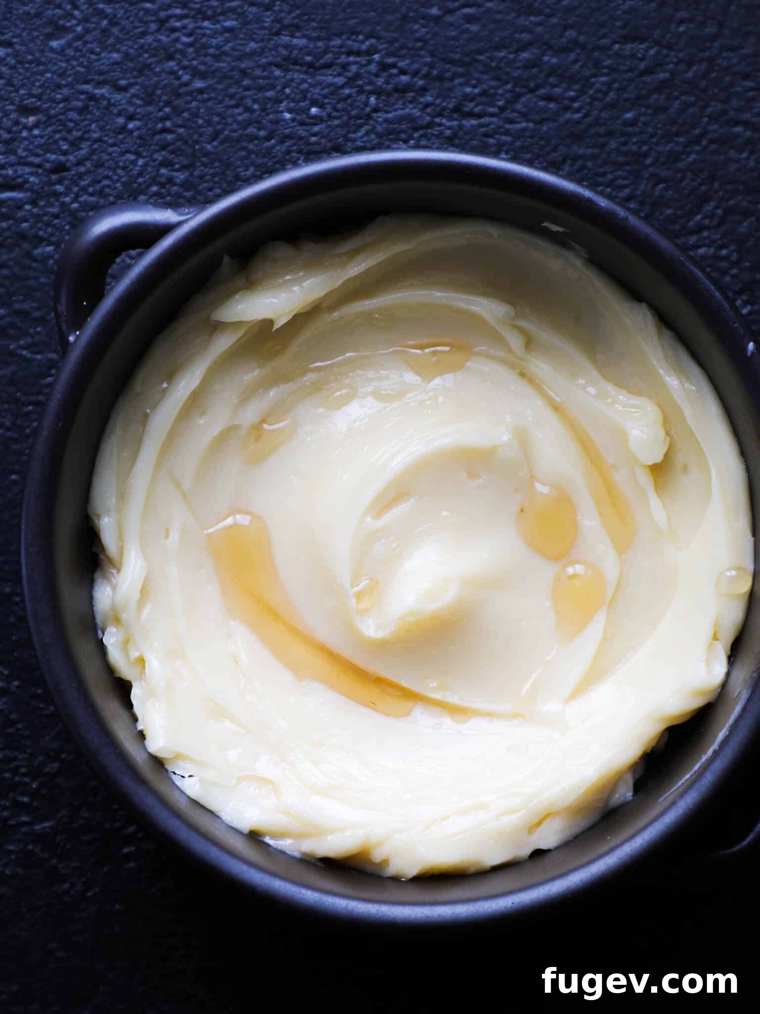Velvety Maple Butter 2 A bowl of creamy homemade maple butter, ready to be served.