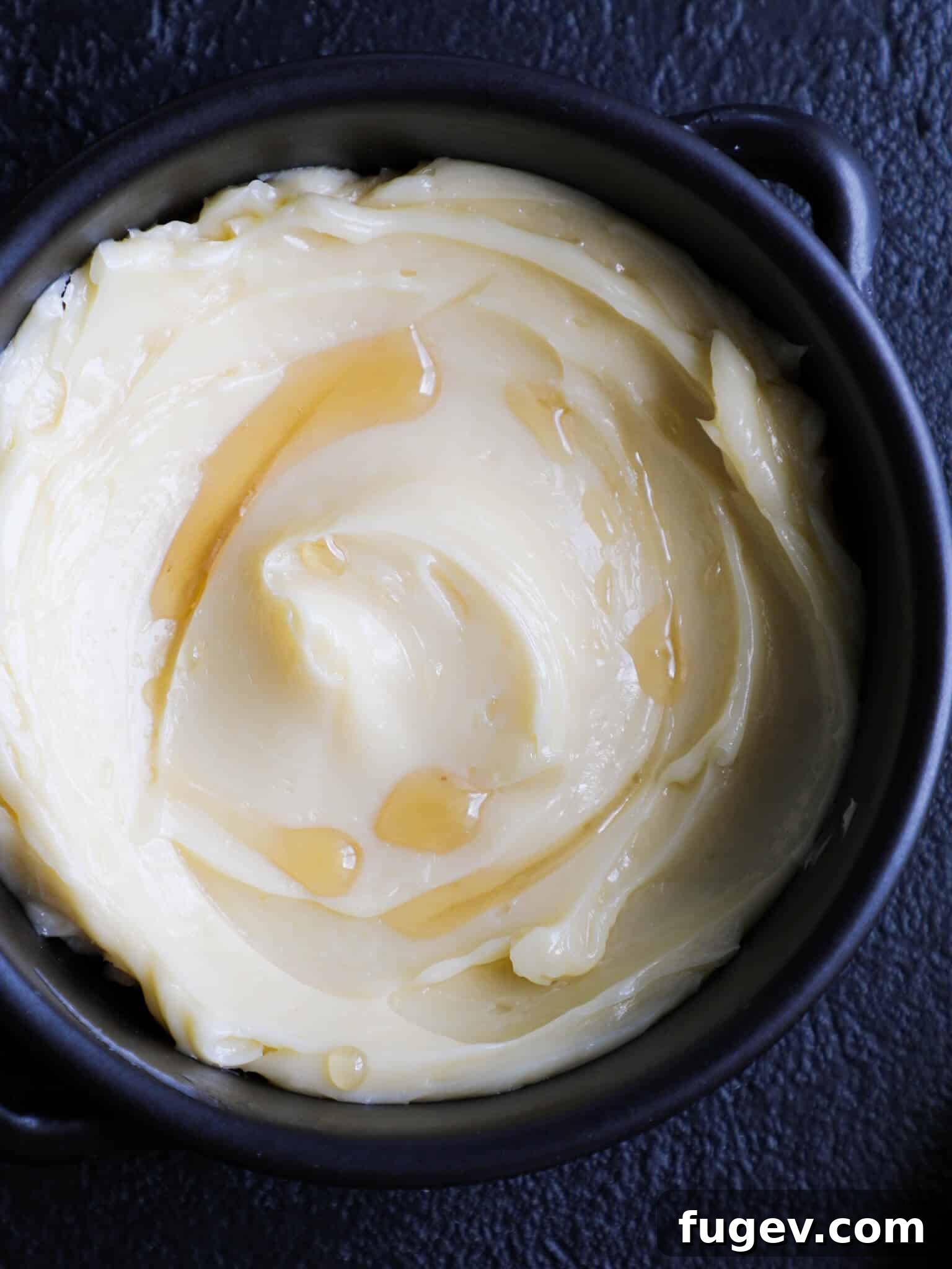 Velvety Maple Butter 4 Maple butter with dark shadows, showcasing its rustic and natural appeal.