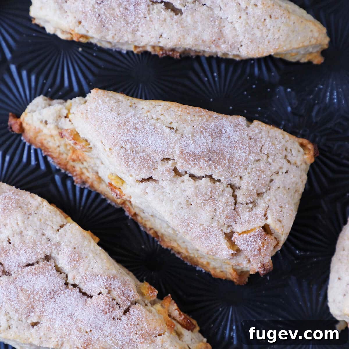 Harvest Apple Spice Scones 4 Close-up of a Spiced Apple Scone, showing its beautiful cracked top texture