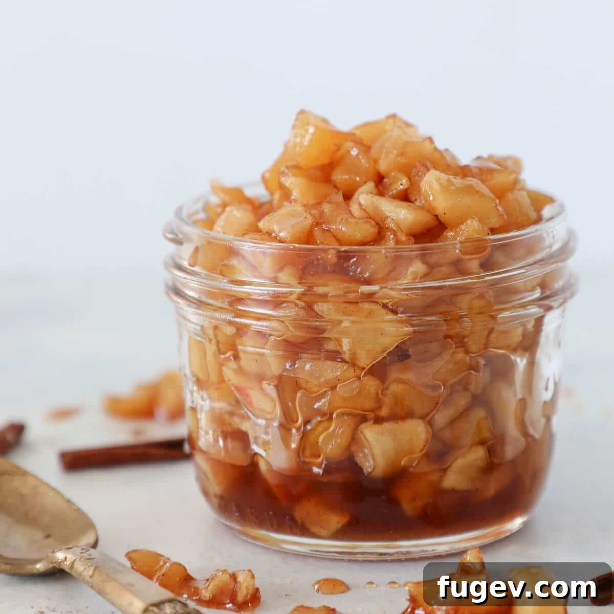 Effortless Apple Compote 3 Easy Apple Compote stored in a glass jar