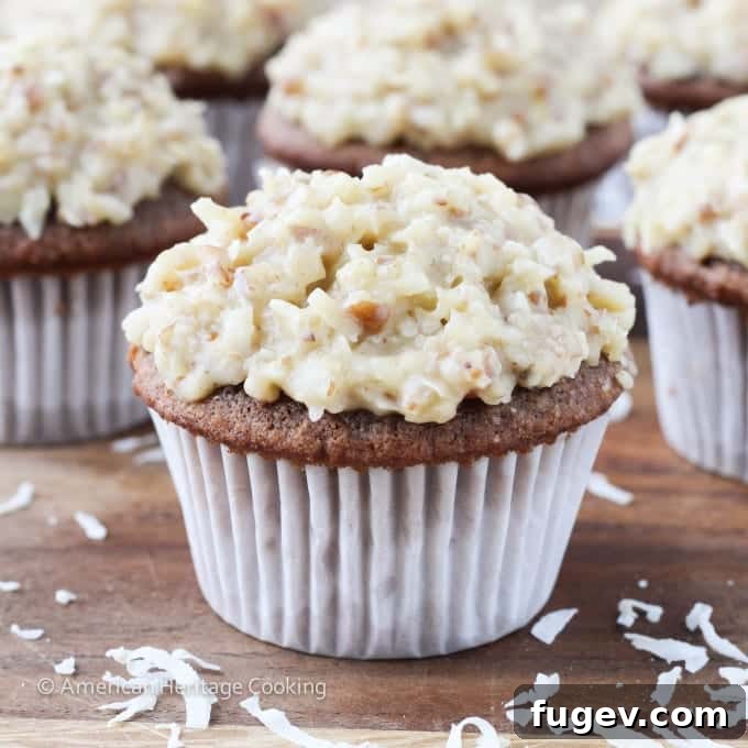 Decadent German Chocolate Cupcakes 6 Cross-section of German Chocolate Cupcake showing fluffy cake and ganache