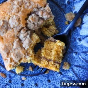 Pumpkin Crumb Coffee Cake, with a delicious forkful taken out