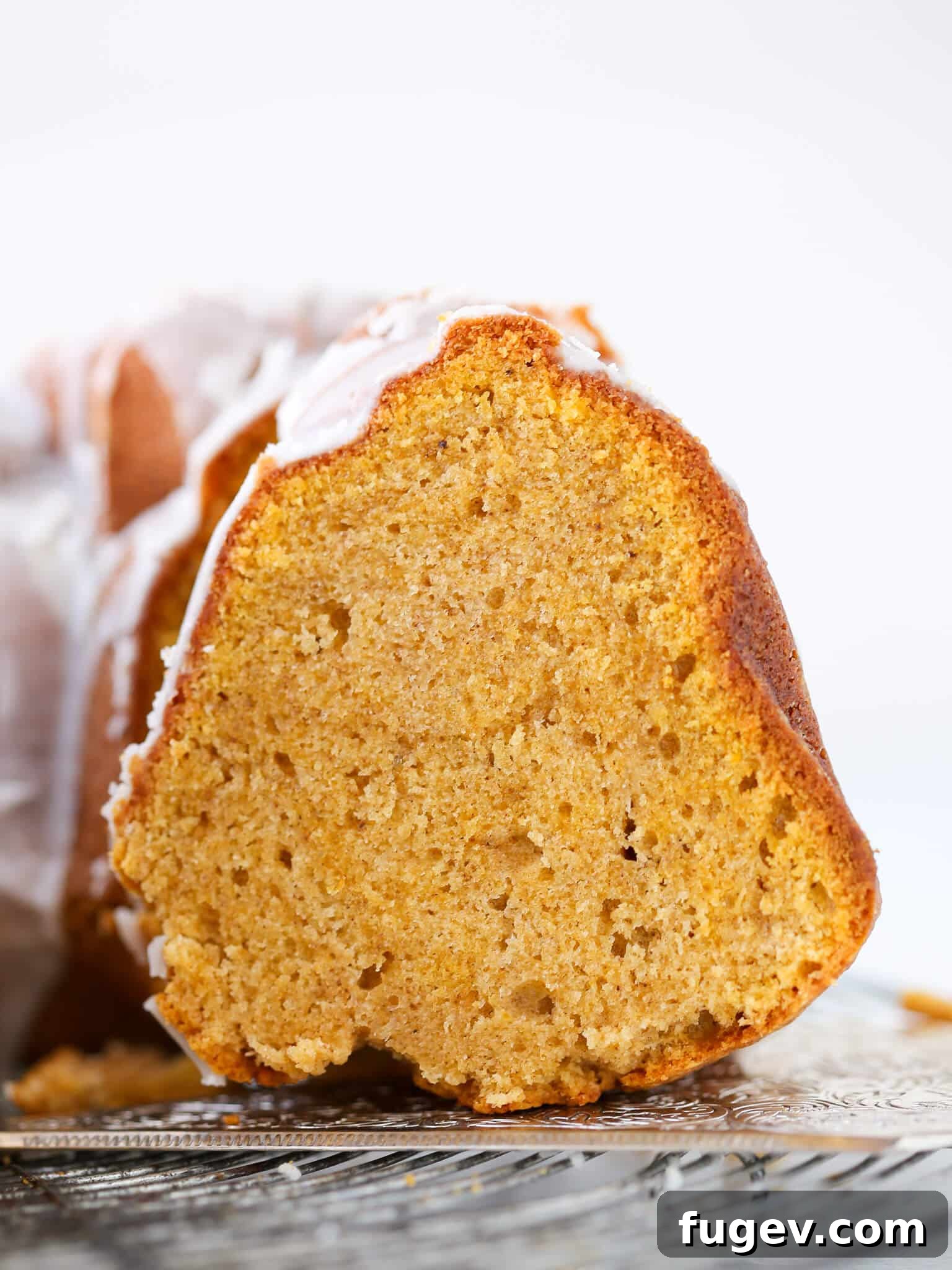 25 Irresistible Pumpkin Recipes for Fall 15 Pumpkin Spice Bundt Cake, showcasing its interior crumb