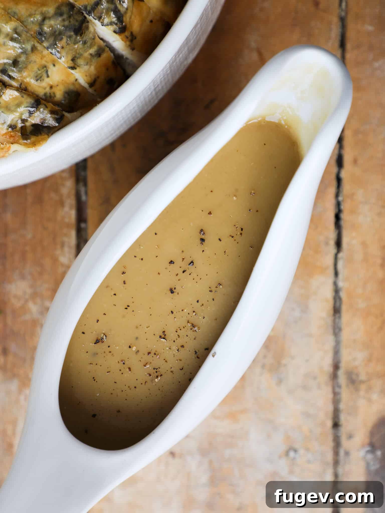 Perfect Gravy from Pan Drippings 2 Gravy From Scratch White Gravy Dish, showcasing a perfectly smooth, rich gravy in a serving dish.