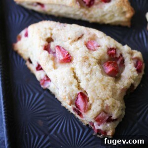 Strawberry Lemon Scones single scone on baking sheet