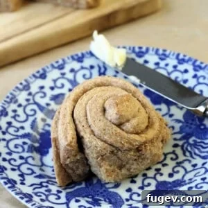 35 Essential Thanksgiving Sides 9 A single freshly baked Whole Wheat Roll, with crisp edges and a soft, slightly domed top.