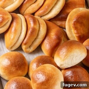 35 Essential Thanksgiving Sides 10 A large group of golden Parker House Rolls, perfectly baked and ready to be pulled apart.