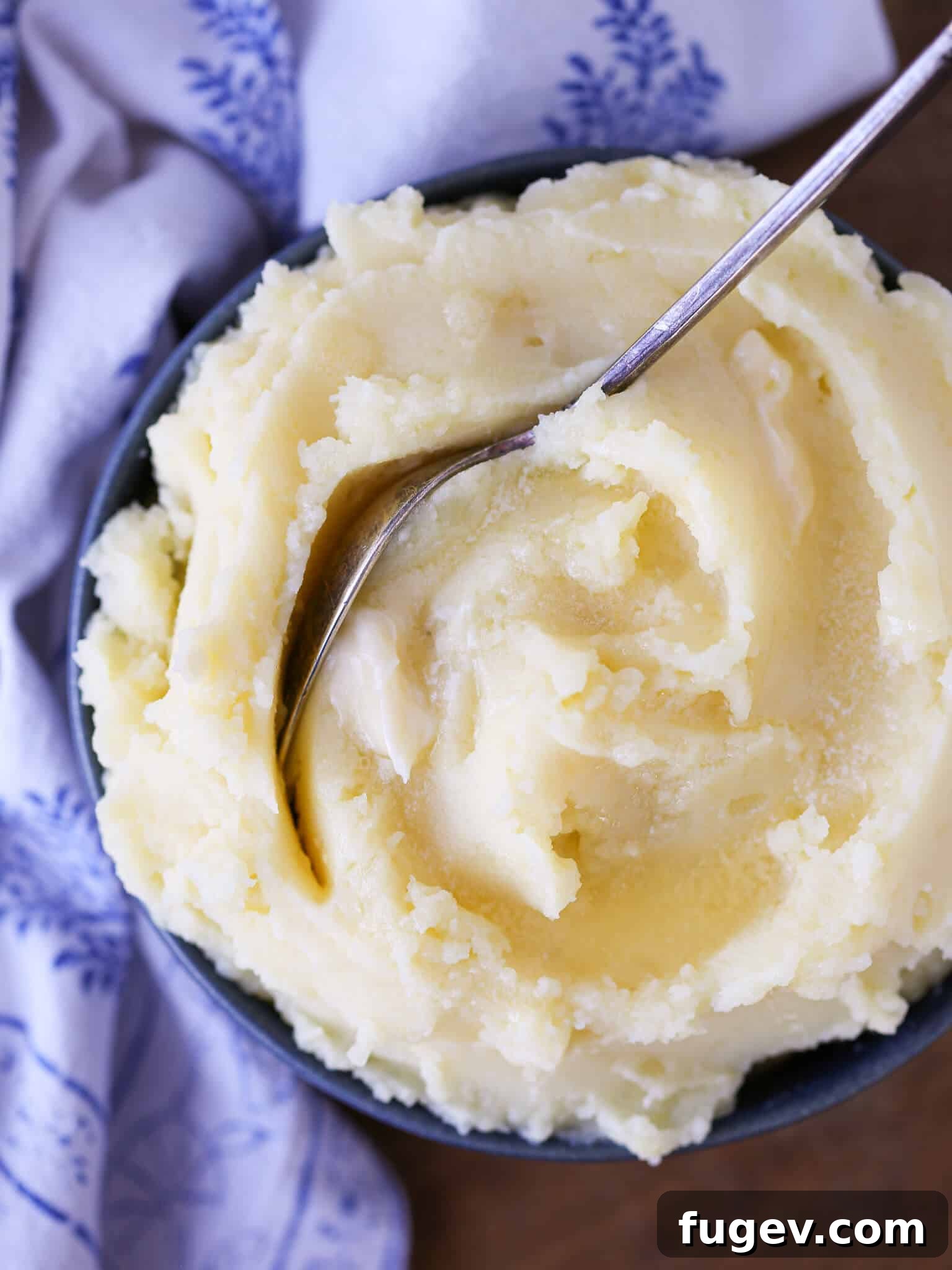 35 Essential Thanksgiving Sides 25 Creamy Mashed Potatoes with melted butter, one of the 30 best Thanksgiving side dishes.
