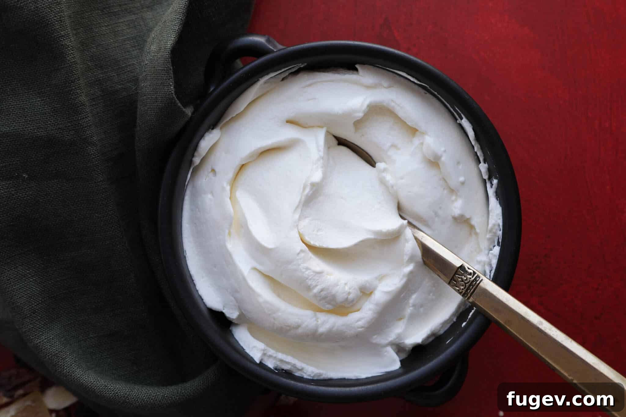 Heritage Fruitcake 9 A bowl of freshly made homemade whipped cream, ready to accompany the fruit cake