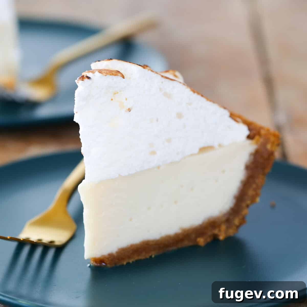 Irresistible Thanksgiving Pie Delights 27 A perfectly baked Key Lime Pie, featured as one of the 20 best Thanksgiving pie recipes, showcasing its vibrant green filling and fluffy meringue.