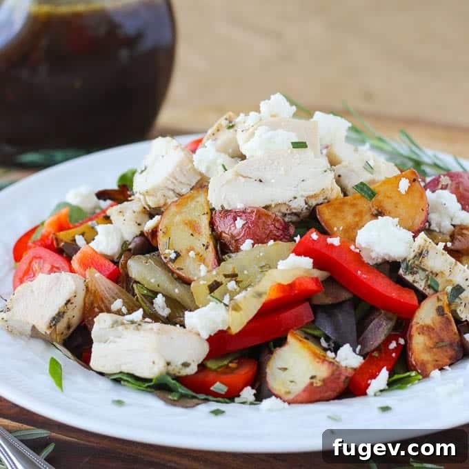 Lemon-Kissed Rosemary Roasted Vegetable Medley 2 Warm Lemon Rosemary Roasted Vegetable Salad with golden potatoes, fresh rosemary, and lemon slices