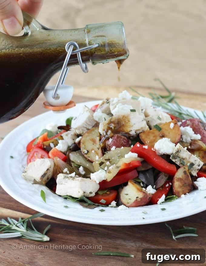Lemon-Kissed Rosemary Roasted Vegetable Medley 5 Warm Lemon Rosemary Roasted Vegetable Salad with sliced grilled chicken on top