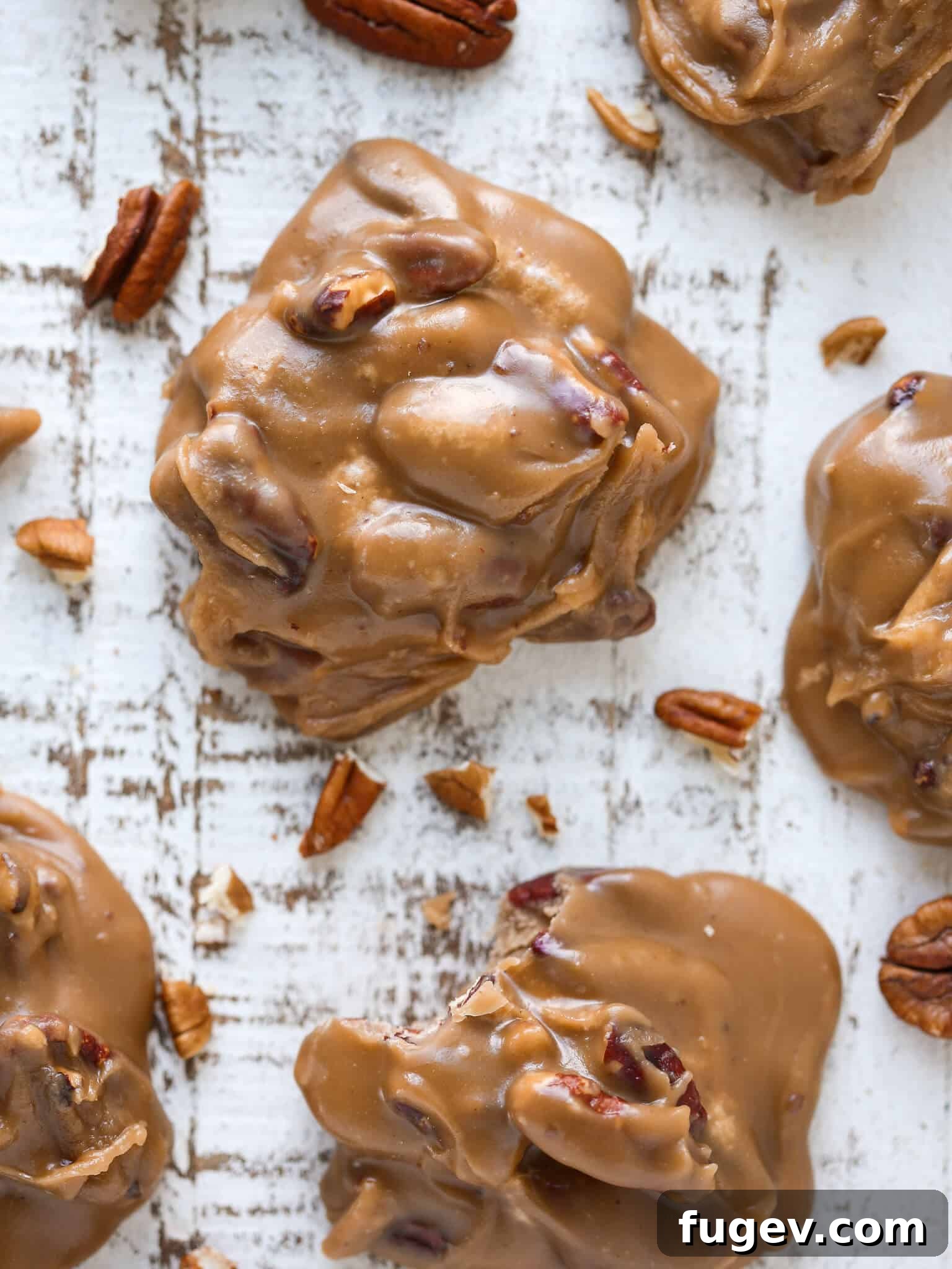Caramel Pecan Bliss 2 Caramel colored top of a pecan praline studded with nuts.