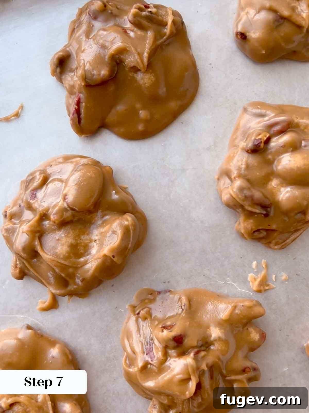 Caramel Pecan Bliss 11 pralines on waxed paper cooling.