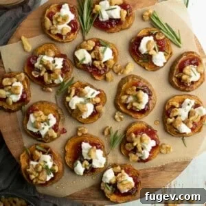Stress-Free Thanksgiving Recipes 12 Sweet potato and goat cheese bites, beautifully garnished with rosemary, ready to be enjoyed.