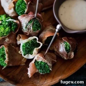 Stress-Free Thanksgiving Recipes 16 A simple yet elegant prosciutto wrapped broccoli appetizer, ready to be savored.