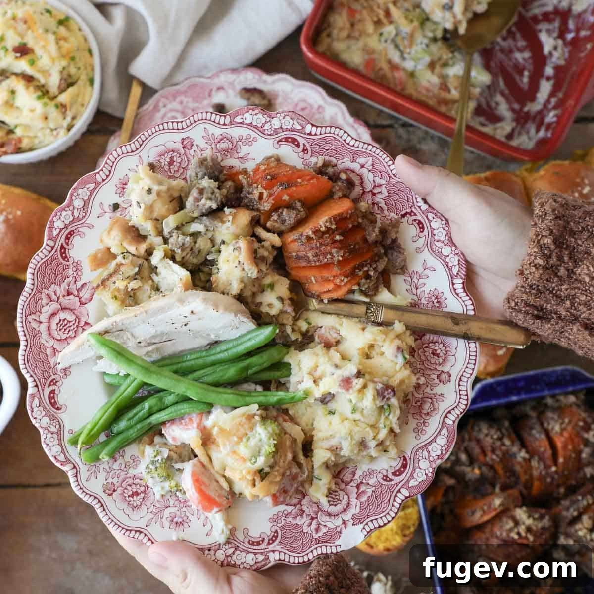 Stress-Free Thanksgiving Recipes 3 A delicious Thanksgiving dinner plate piled high with a selection of easy holiday dishes, ready to be enjoyed.