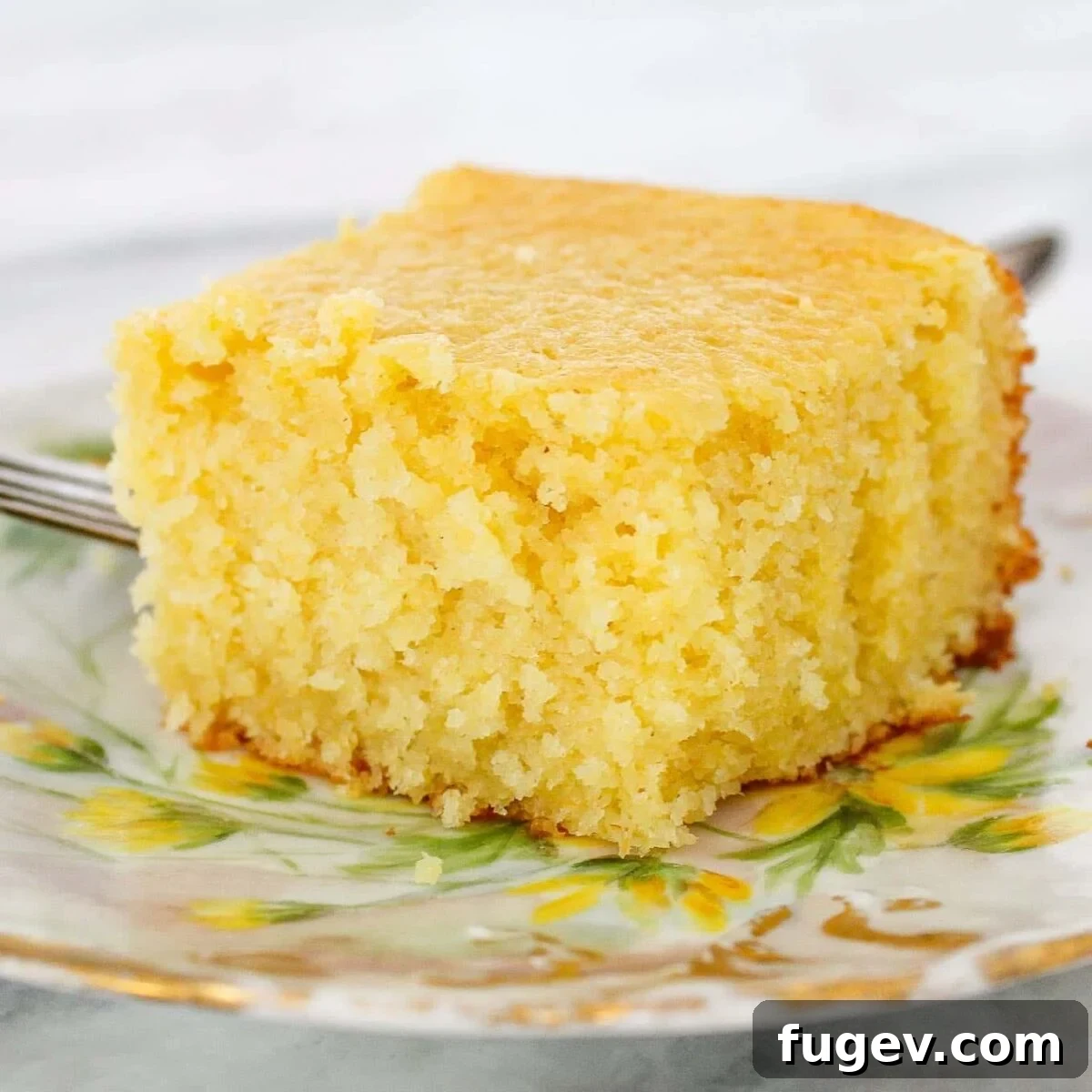 Stress-Free Thanksgiving Recipes 26 A slice of Sweet Southern Cornbread, a beloved dish among the 30 Best Thanksgiving Side Dishes.