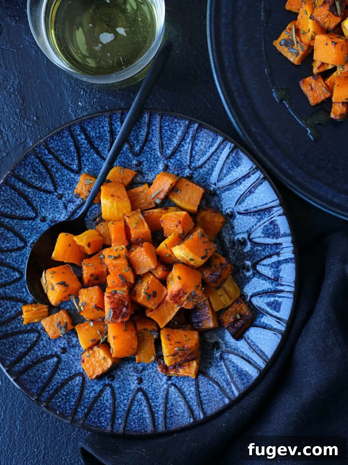 Stress-Free Thanksgiving Recipes 32 Perfectly plated Spiced Roasted Butternut Squash, a delightful and healthy side dish.
