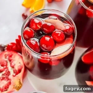 Stress-Free Thanksgiving Recipes 5 A glass full of festive red Thanksgiving sangria, ready to be enjoyed.