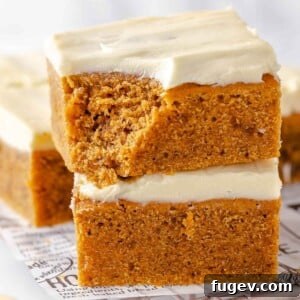 Stress-Free Thanksgiving Recipes 52 A close-up shot revealing the tender crumb of a perfectly baked pumpkin bar.