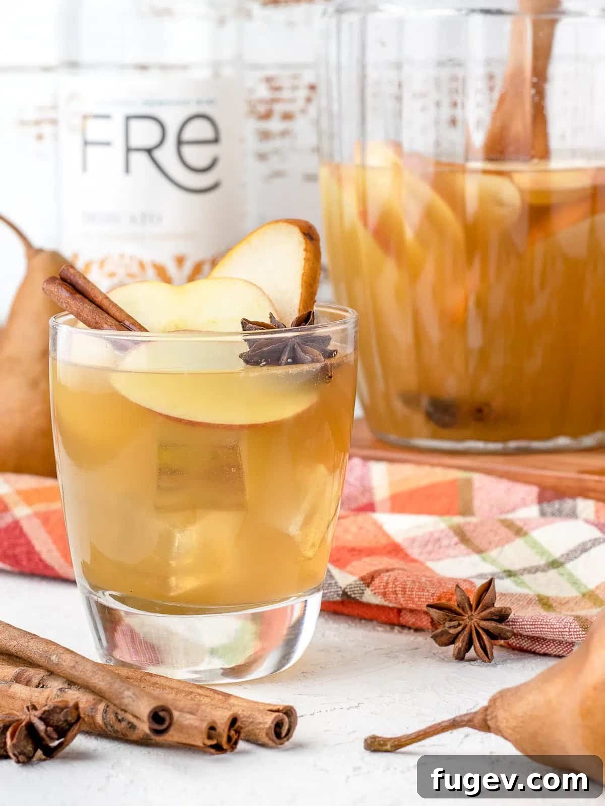 Stress-Free Thanksgiving Recipes 8 An elegant apple cider mocktail in a glass, beautifully garnished for a festive presentation.