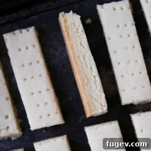 Scottish shortbread with classic fork holes poked into its surface, showcasing its tender texture.