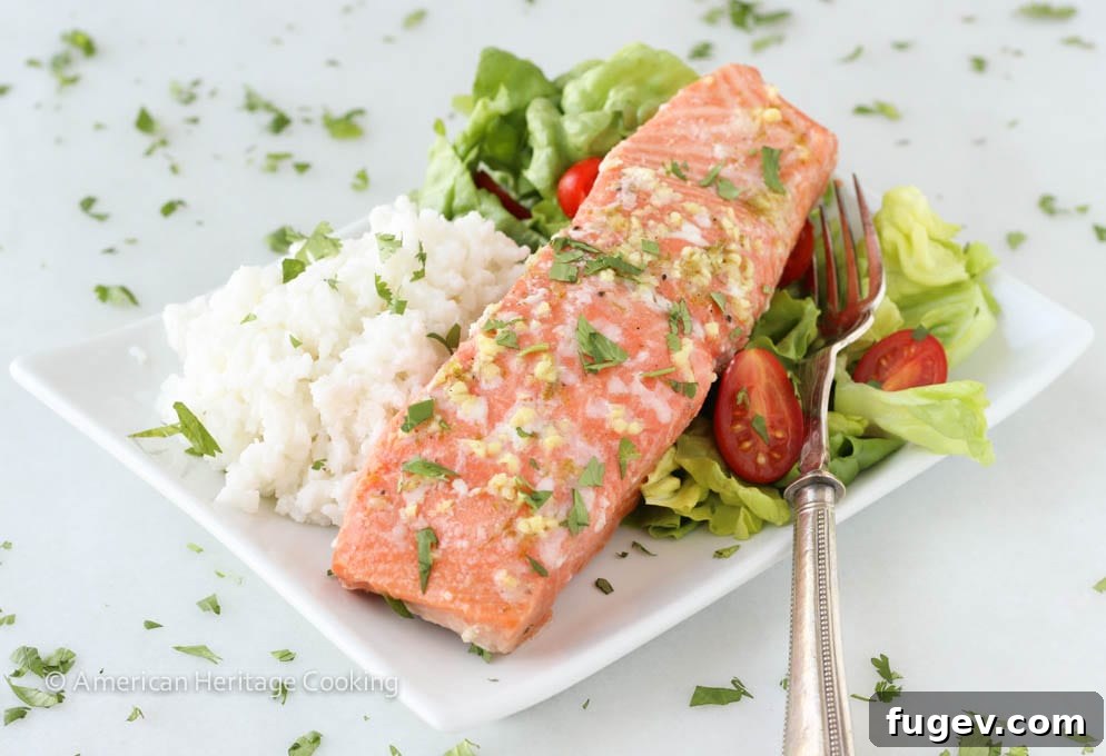 Citrus Ginger Salmon with Creamy Coconut Rice 4 Close-up of baked Ginger Lime Salmon fillet, showing flaky texture and vibrant color.
