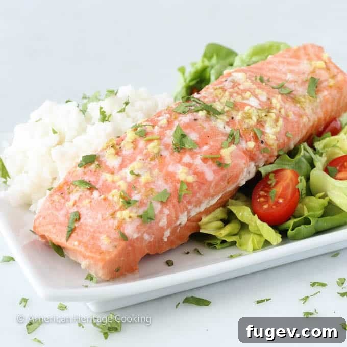 Citrus Ginger Salmon with Creamy Coconut Rice 7 Close-up of Ginger Lime Vinaigrette being drizzled over a salmon fillet in a baking dish.