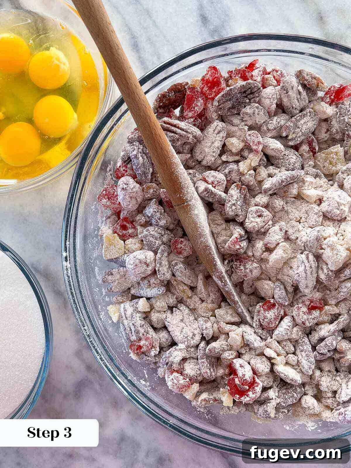 Candied Fruit Confection 7 Flour-tossed fruit and nuts, prepared to be added to the cake batter.